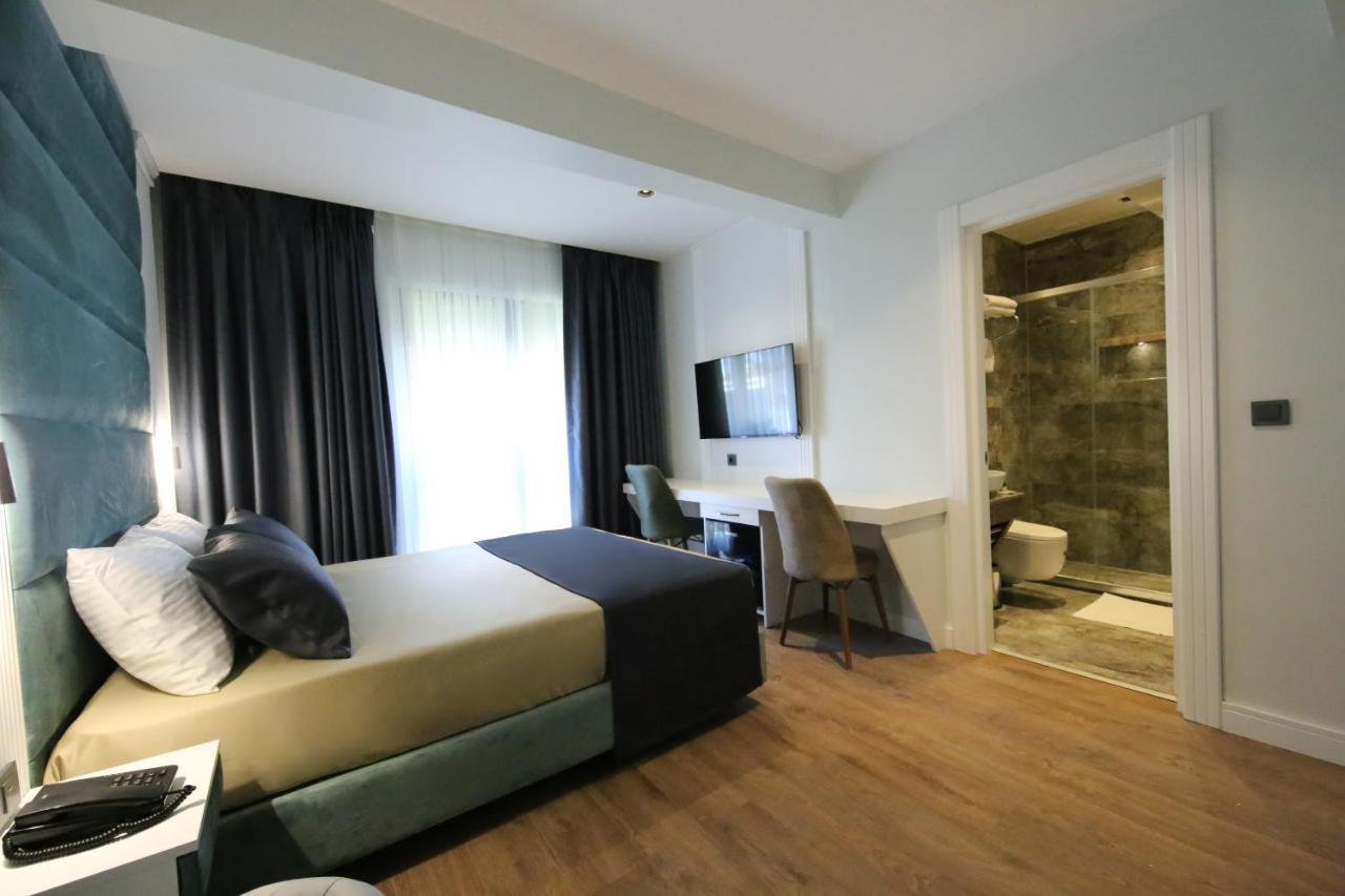 Axu Airport Hotel Arnavutkoy Экстерьер фото A room at the hotel