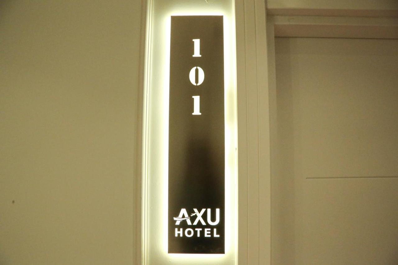 Axu Airport Hotel Arnavutkoy Экстерьер фото A room sign at Axu Hotel