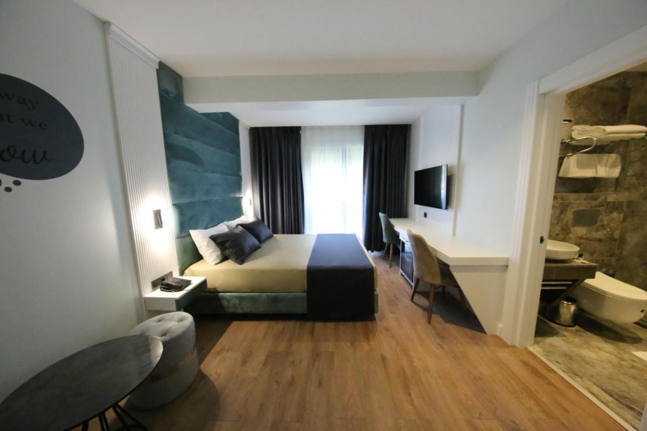 Axu Airport Hotel Arnavutkoy Экстерьер фото A room at the hotel